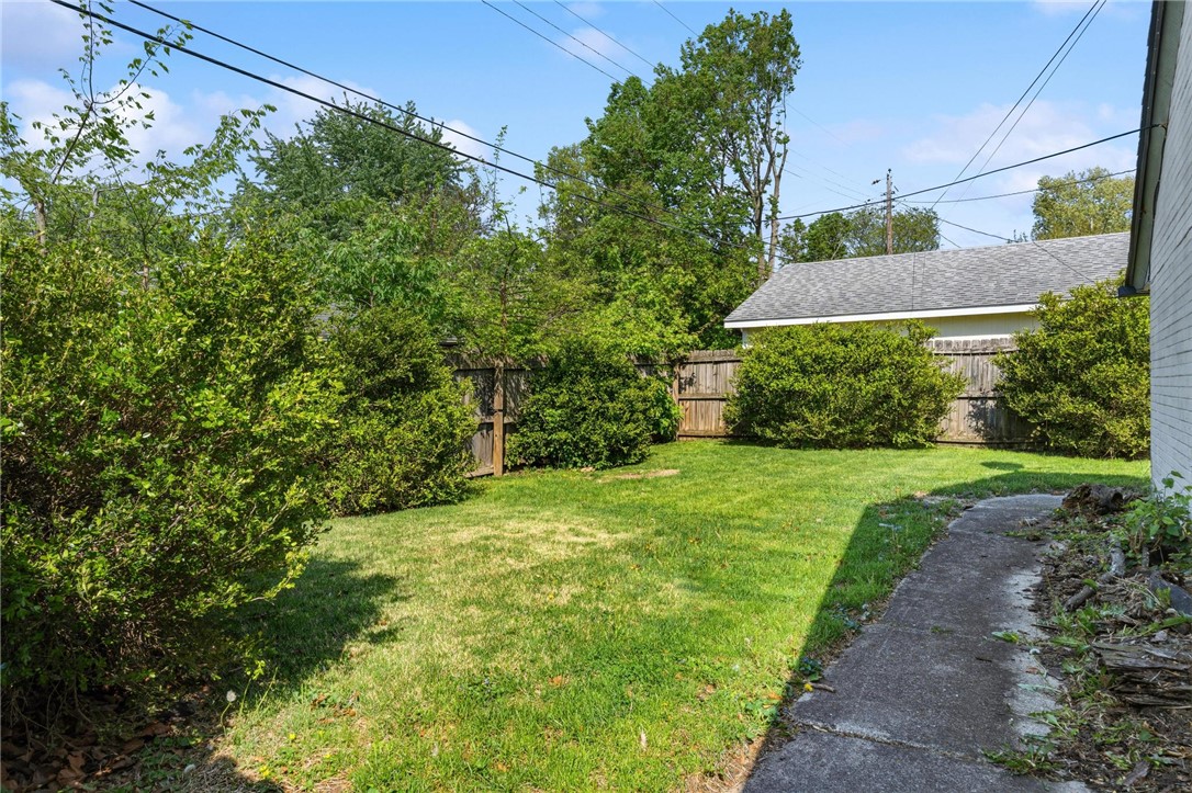 3890 Endover Road Dayton, OH 45439 - Photo 4 of 26 This spacious yard offers ample room for outdoor activities and gardening.