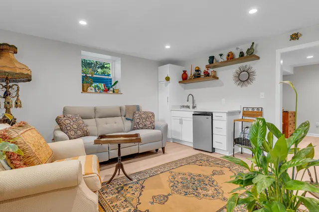 a bed room with a bed and a television