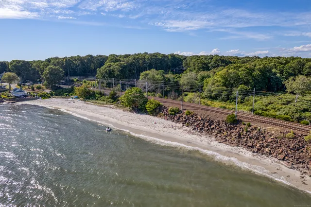 a view of a road with a garden
