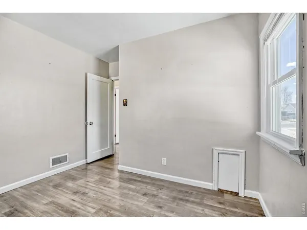 an empty room with windows