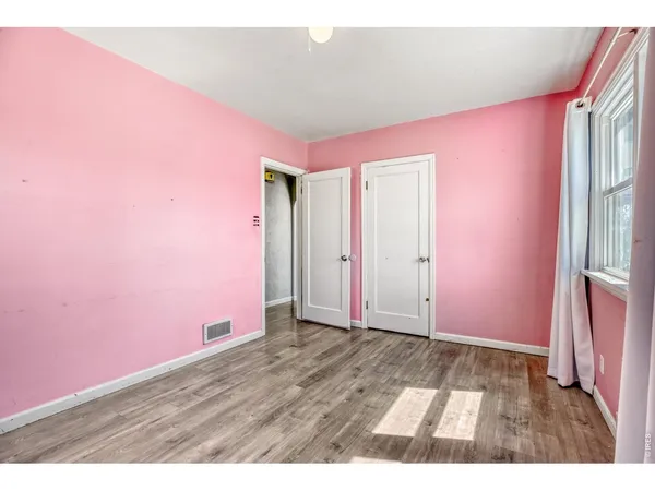a view of an empty room with window