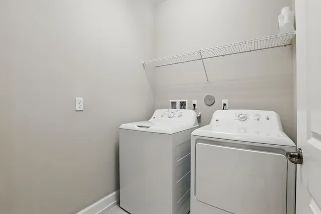 a bedroom with furniture window and wooden floor