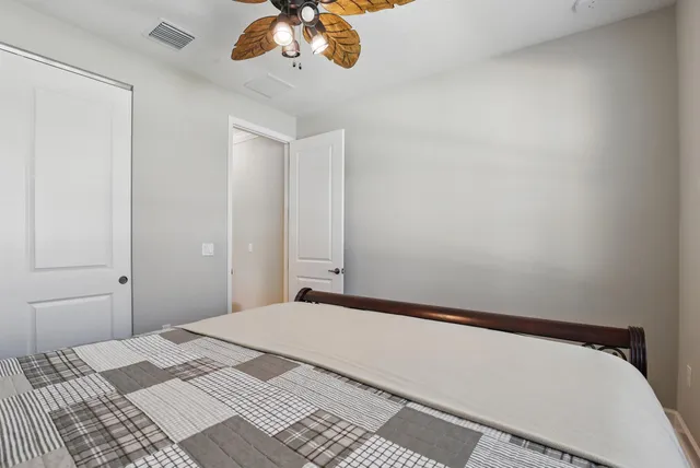 a swimming pool with outdoor seating and yard