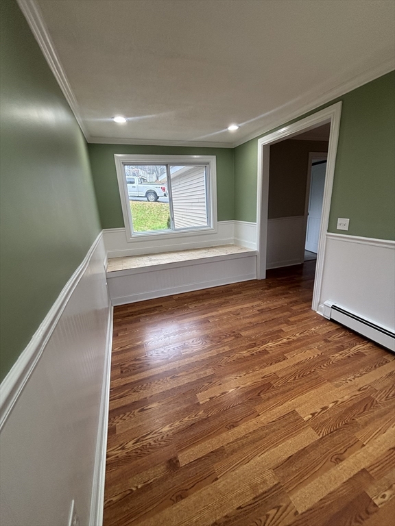 11 Williams Street Dudley, MA 01571 - Photo 12 of 16 a view of room with window and wooden floor