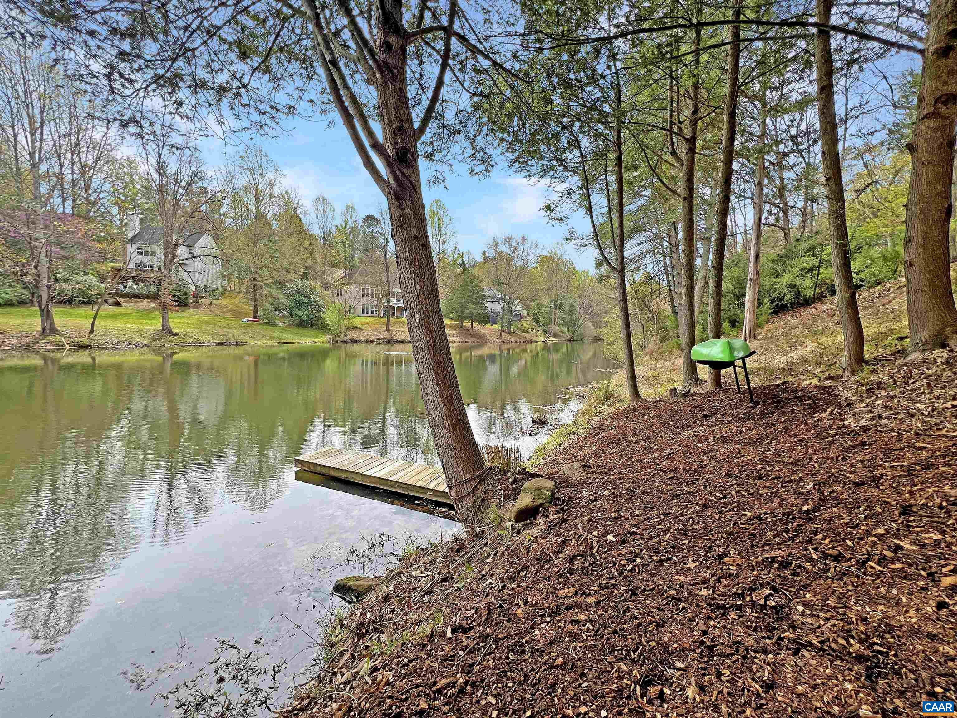 257 Starcrest Road Charlottesville, VA 22902 - Photo 12 of 65 a view of a lake with a large trees