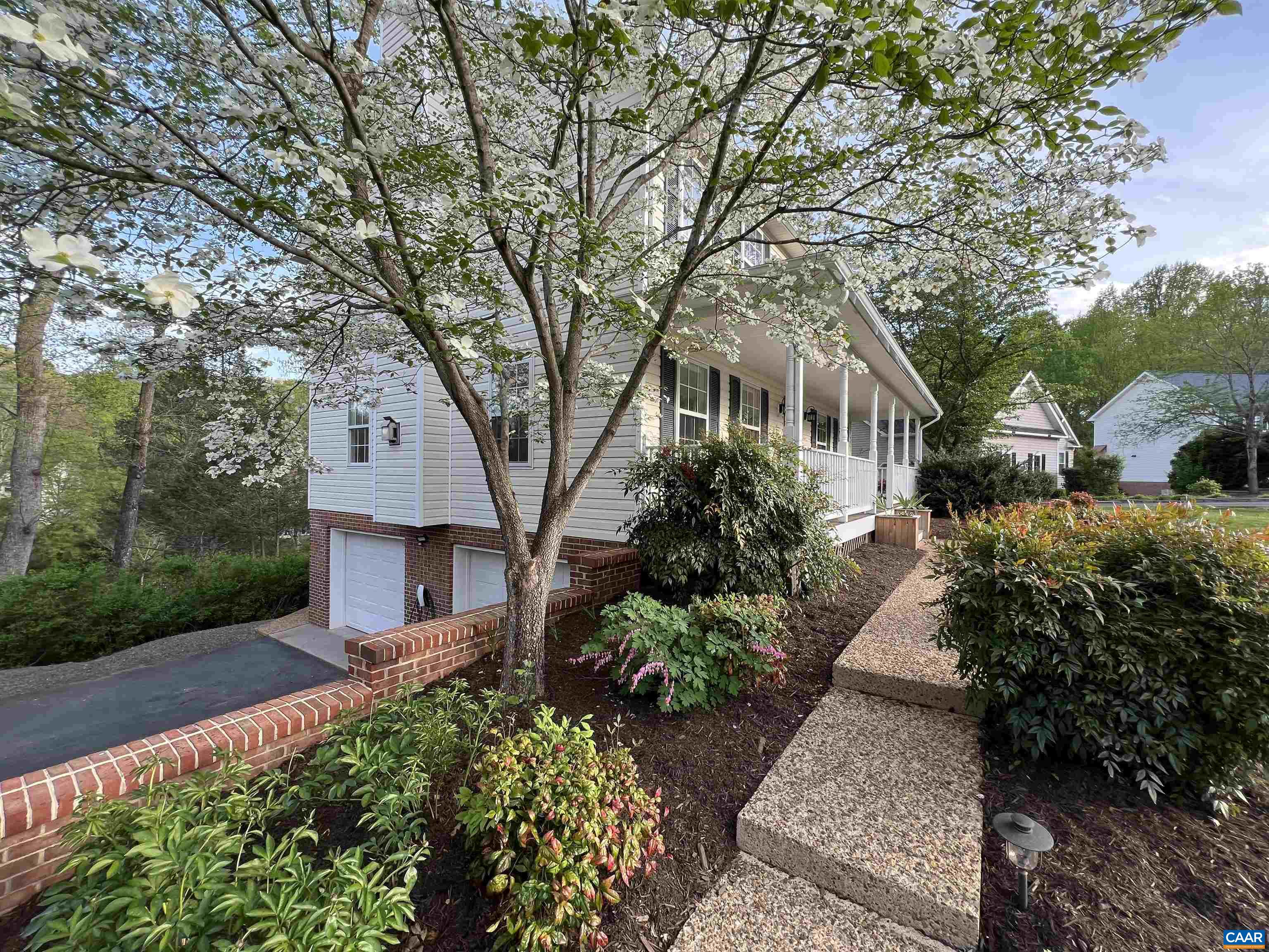 257 Starcrest Road Charlottesville, VA 22902 - Photo 65 of 65 a front view of a house with garden