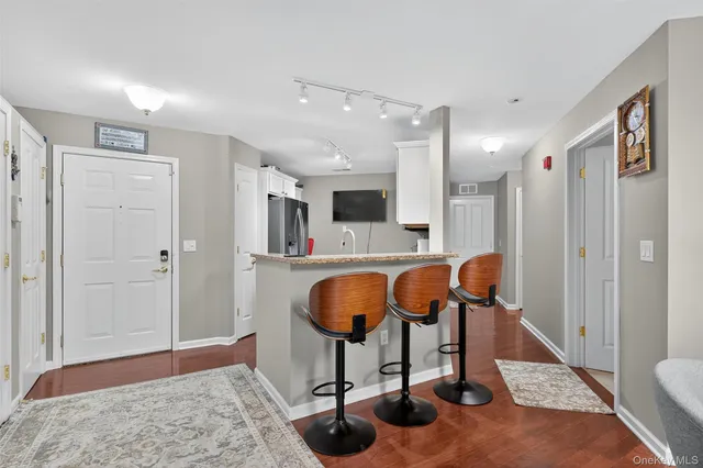 a view of living room with furniture and rug