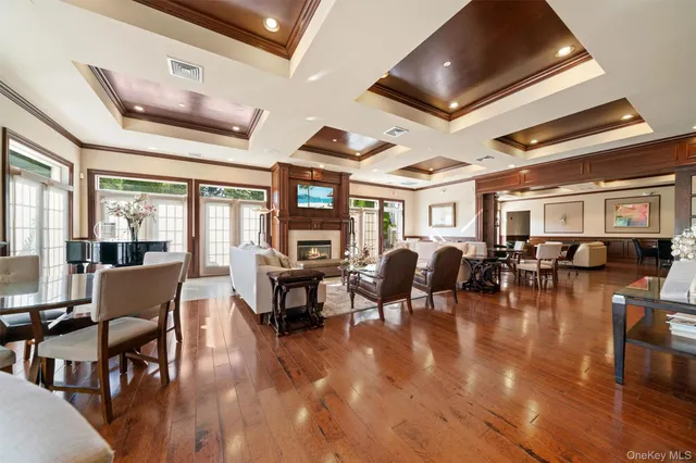 a very nice looking living room with furniture and a large window
