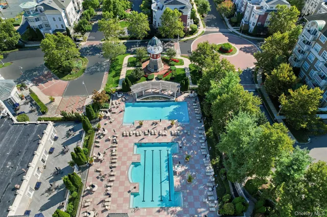 a view of a house with a yard and garden