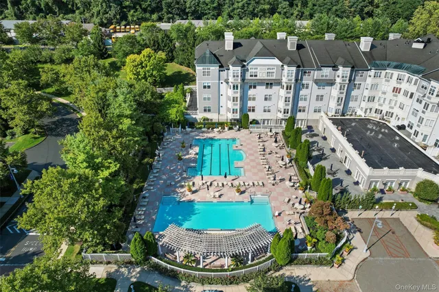 a view of houses with outdoor space and lakeside