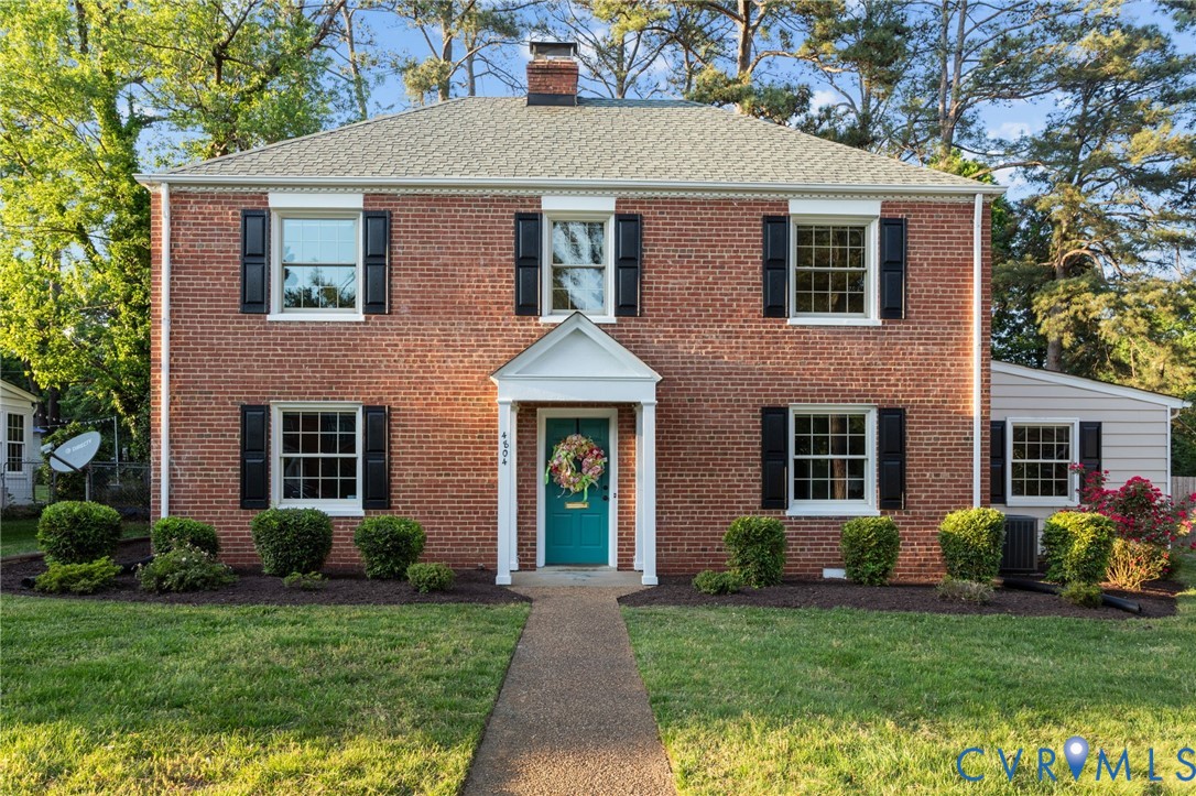4804 Morrison Road Richmond, VA 23230 - Photo 2 of 48 a front view of a house with a yard