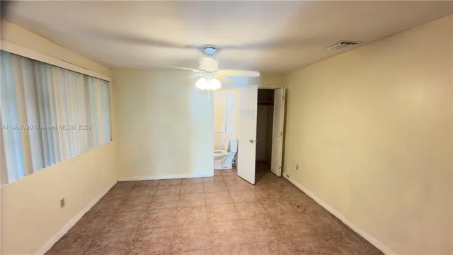 an empty room with a natural light