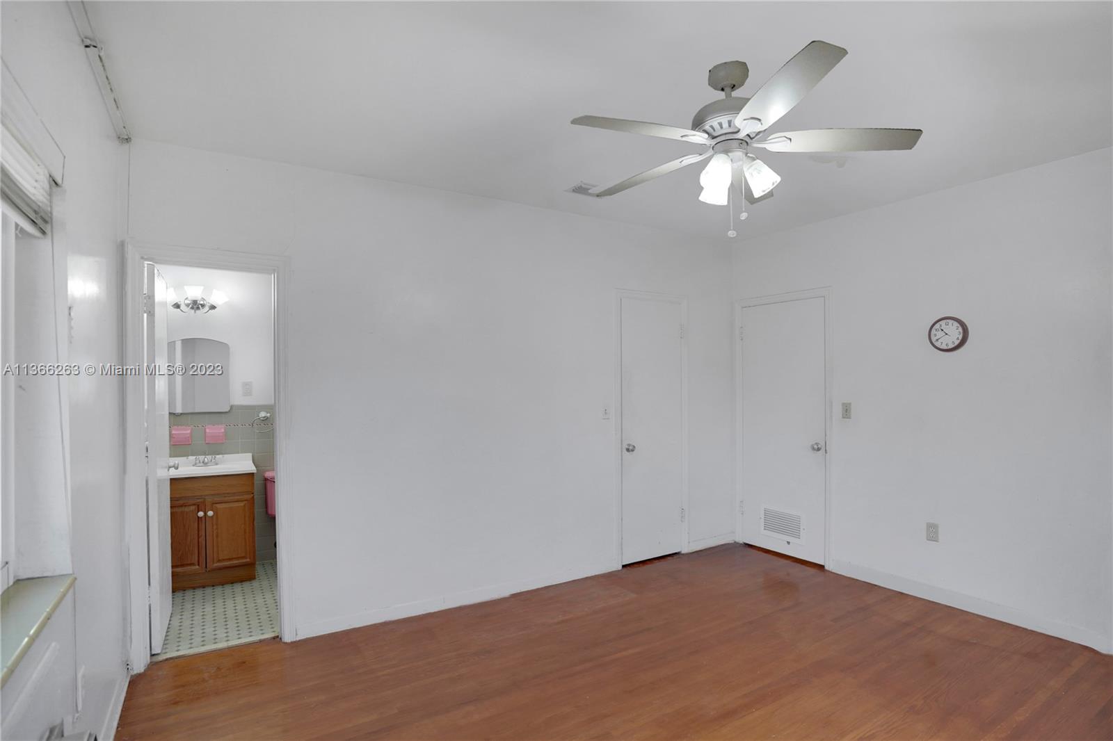 300 Northeast 48th Street Miami, FL 33137 - Photo 17 of 31 a view of a livingroom and a bathroom