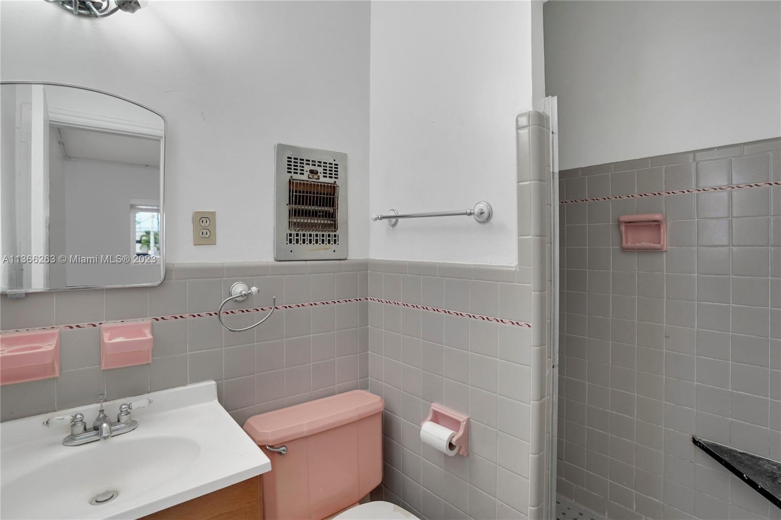 300 Northeast 48th Street Miami, FL 33137 - Photo 20 of 31 a bathroom with a sink a toilet and shower