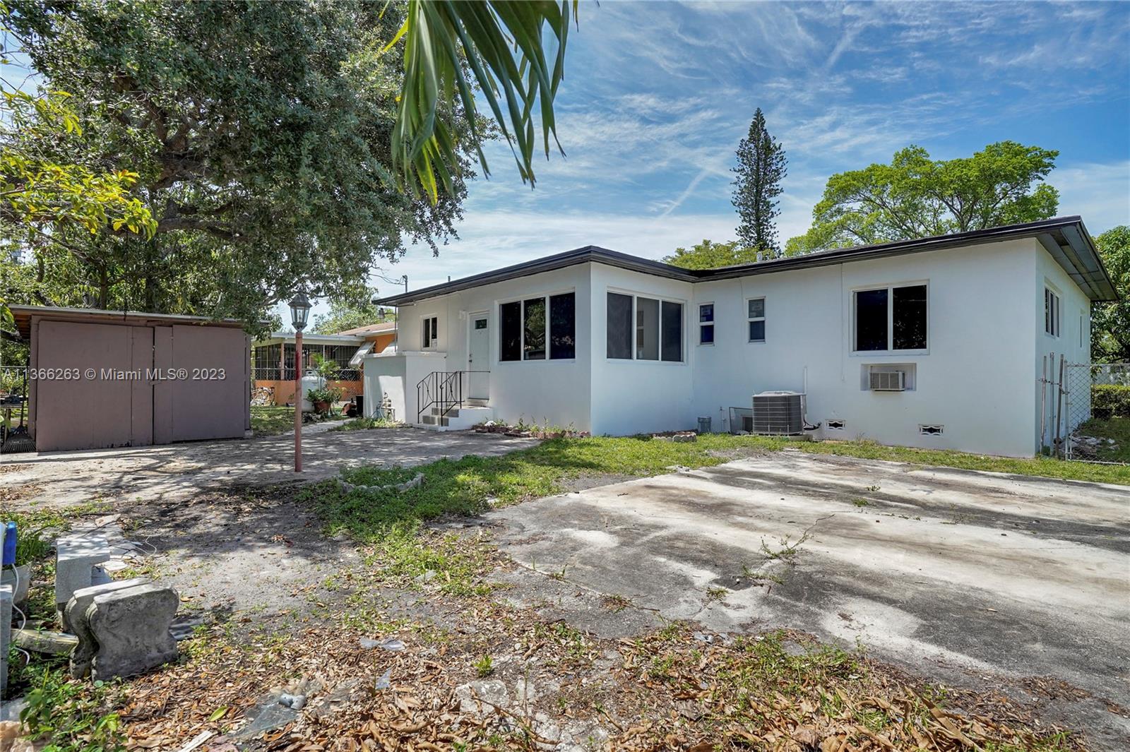 300 Northeast 48th Street Miami, FL 33137 - Photo 27 of 31 a house view with a backyard space