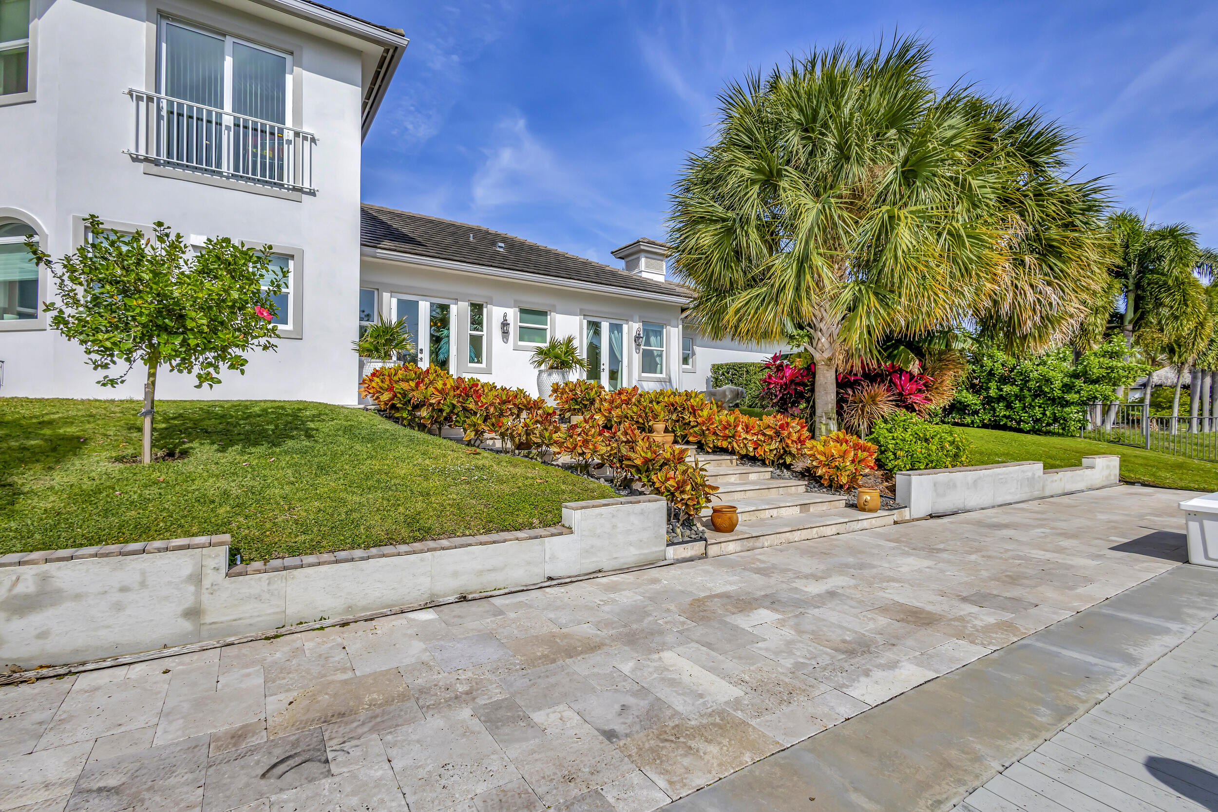 2138 Ascott Road North Palm Beach, FL 33408 - Photo 59 of 87 Side Patio/Canal Side