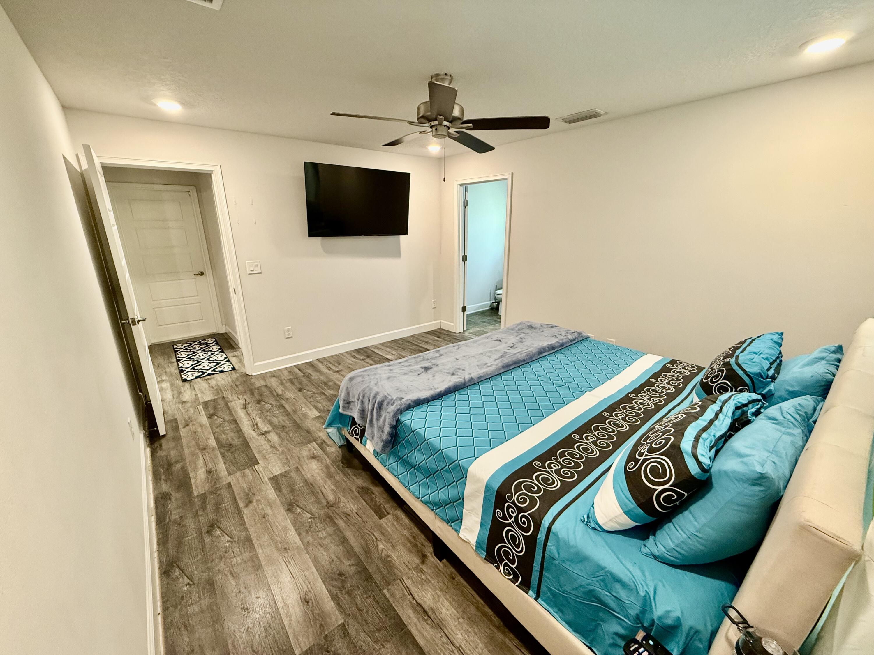 4480 Southwest Jaunt Road Port St. Lucie, FL 34953 - Photo 21 of 31 Main Bedroom