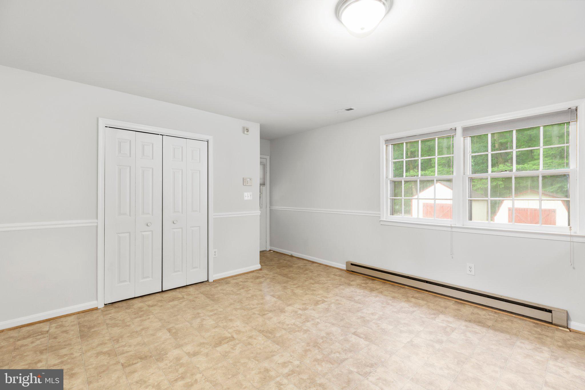 67 Holly Corner Road Fredericksburg, VA 22406 - Photo 13 of 34 The dining area has convenient carport access