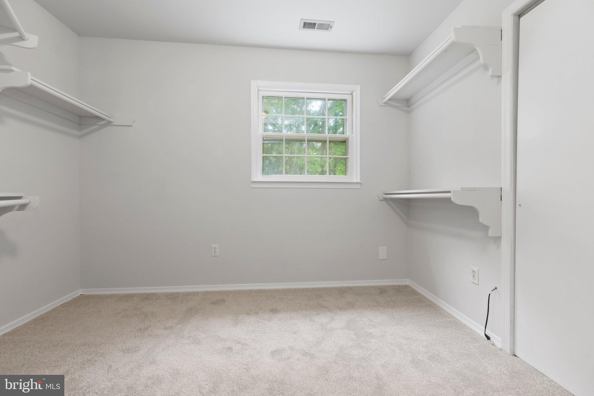 67 Holly Corner Road Fredericksburg, VA 22406 - Photo 18 of 34 Check out the walk-in closet in the primary bdrm