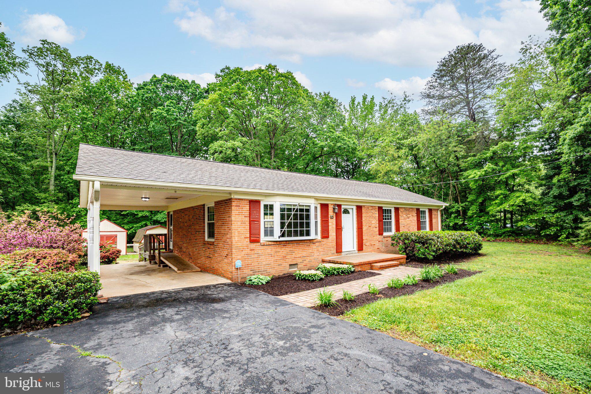67 Holly Corner Road Fredericksburg, VA 22406 - Photo 27 of 34 The front walkway has been freshly landscaped
