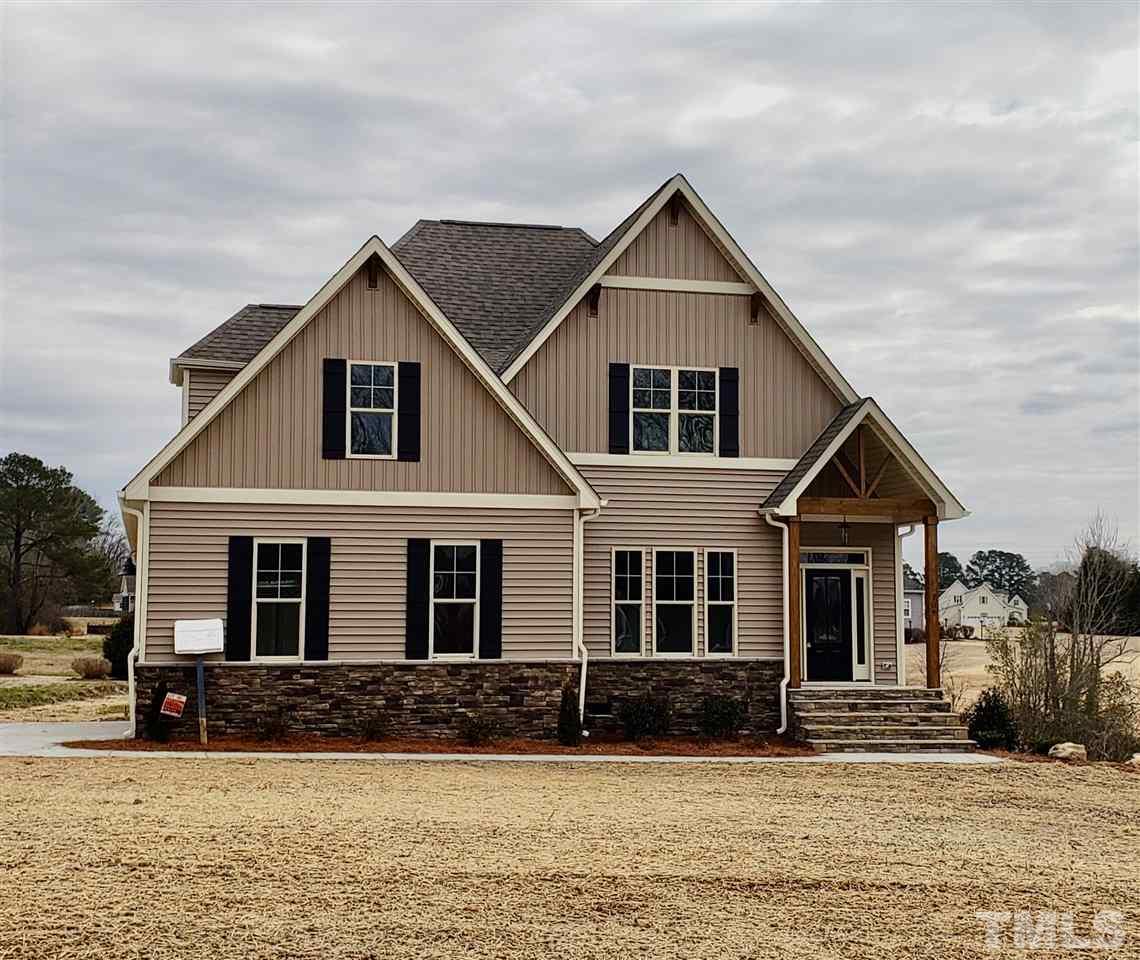 L6 Harvest Rdg Road Nashville, NC 27856 - Photo 1 of 1 a front view of a house with a yard
