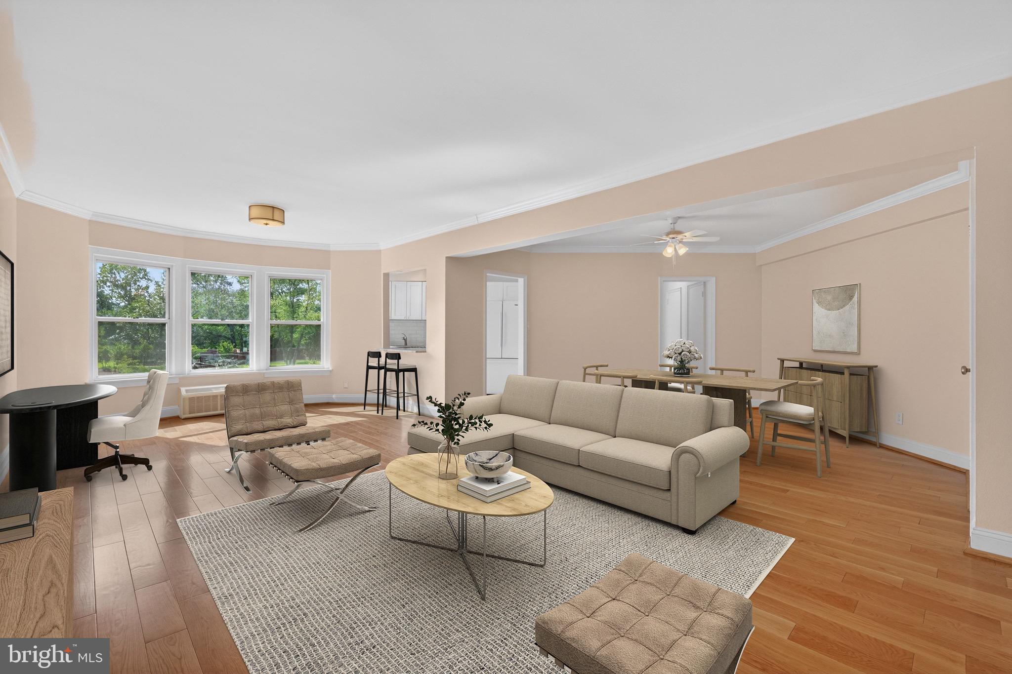2500 Q Street Northwest, Unit 227 Washington, DC 20007 - Photo 2 of 13 a living room with furniture and a large window