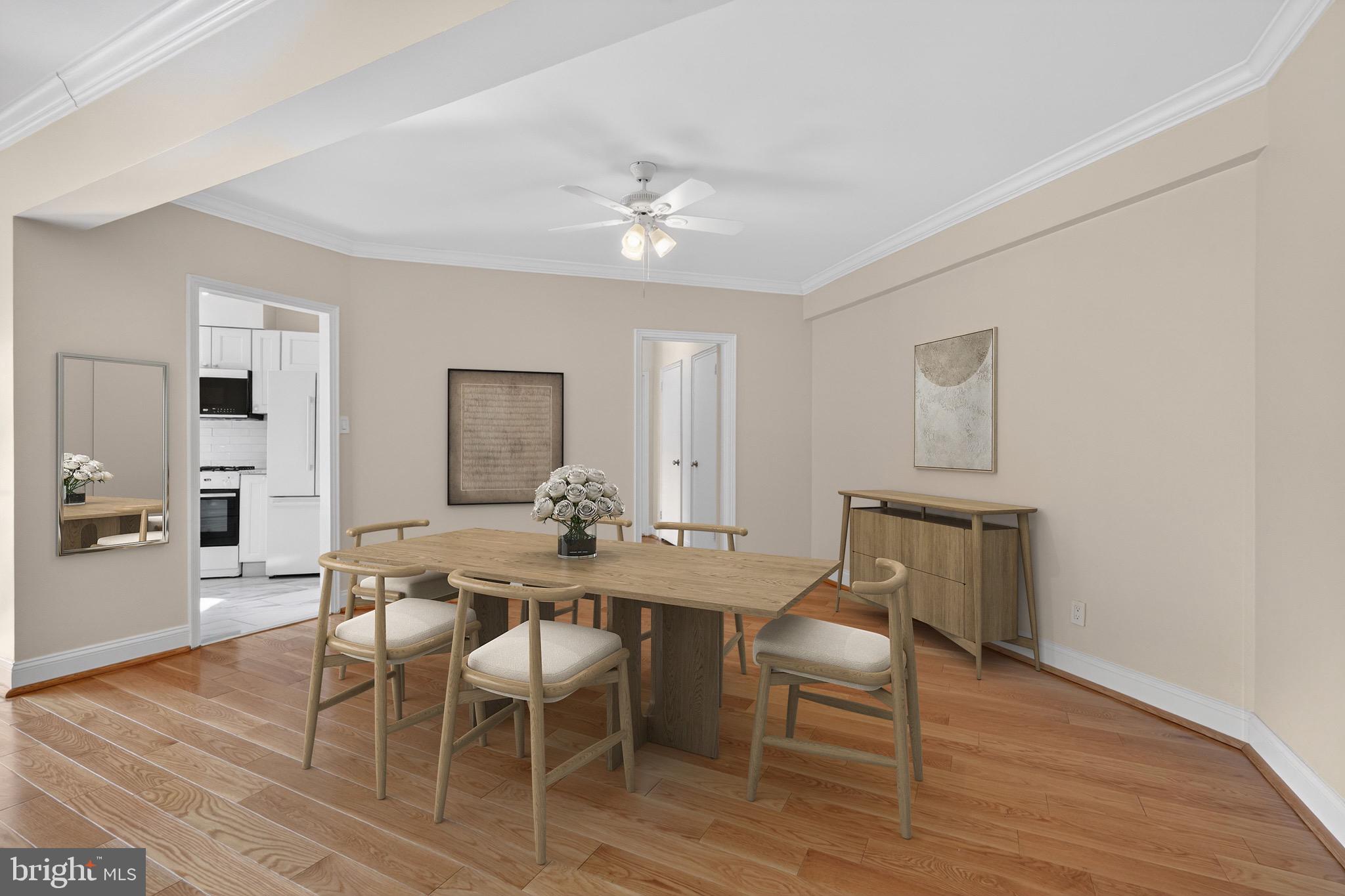 2500 Q Street Northwest, Unit 227 Washington, DC 20007 - Photo 4 of 13 a view of a dining room with furniture and wooden floor