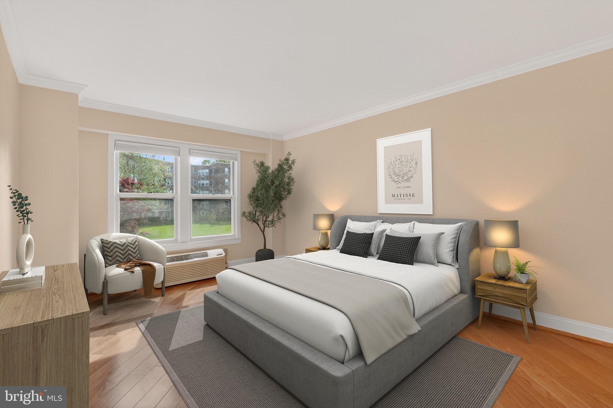 2500 Q Street Northwest, Unit 227 Washington, DC 20007 - Photo 7 of 13 a bedroom with a bed and glass window