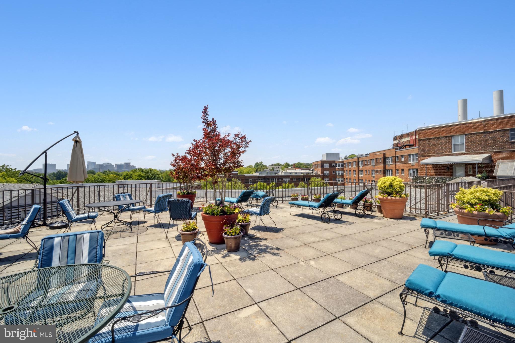 2500 Q Street Northwest, Unit 227 Washington, DC 20007 - Photo 10 of 13 a view of a terrace with seating area