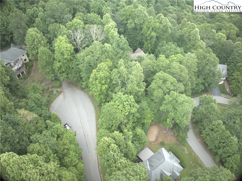 Market Hills Drive Boone, NC 28607 - Photo 4 of 23 an aerial view of a house with a yard and outdoor seating