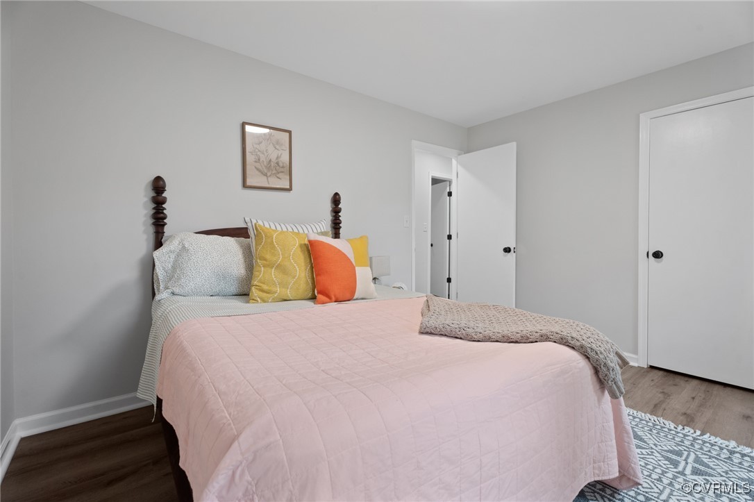 7201 Courthouse Road Chesterfield, VA 23832 - Photo 16 of 41 a large bed sitting in a bedroom and a table
