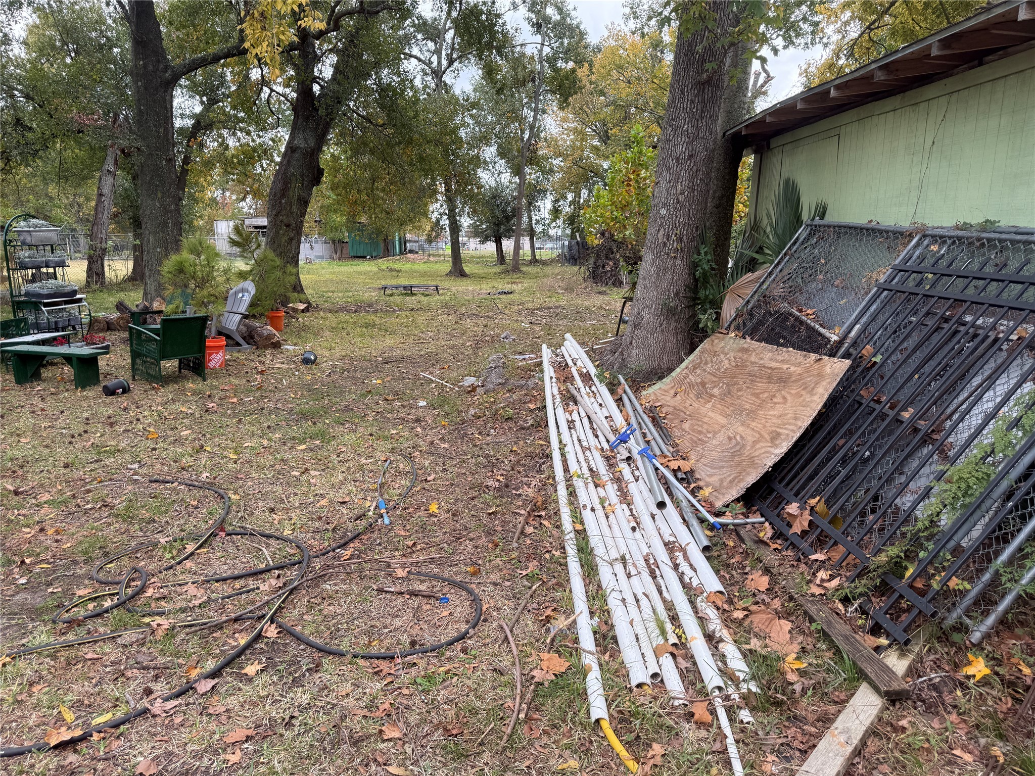 6002 Mohawk Street Houston, TX 77016 - Photo 5 of 10 a view of a backyard with trees