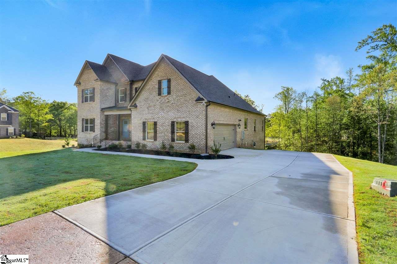 601 Rutland Court, Unit SITE 16 Greer, SC 29651 - Photo 2 of 34 With stamped and stained concrete accent on driveway