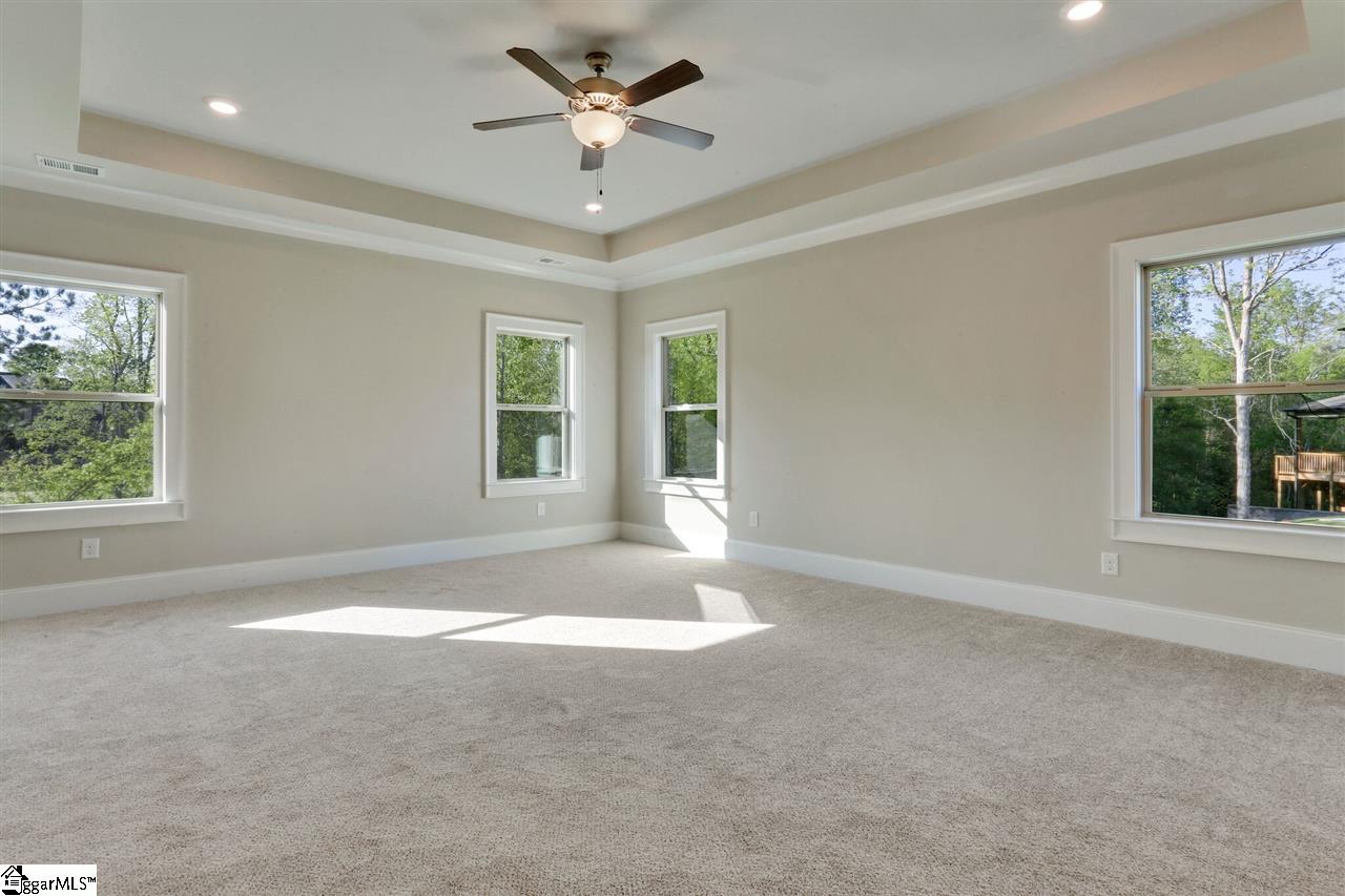 601 Rutland Court, Unit SITE 16 Greer, SC 29651 - Photo 15 of 34 Trey ceiling, added LED lighting and sitting room! Beautiful wooded views!
