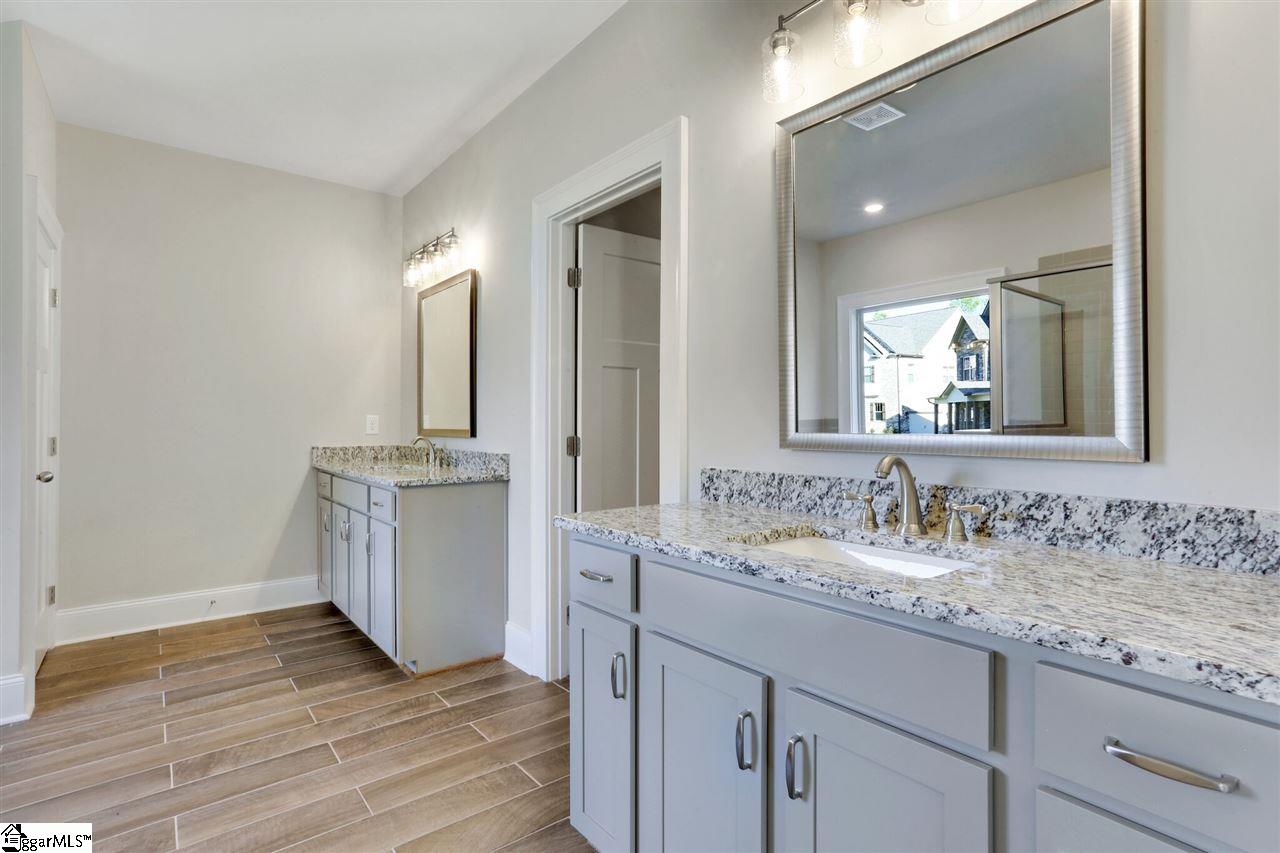 601 Rutland Court, Unit SITE 16 Greer, SC 29651 - Photo 17 of 34 Tile flooring, dual granite vanities with rectangular undermount sinks and private water closet