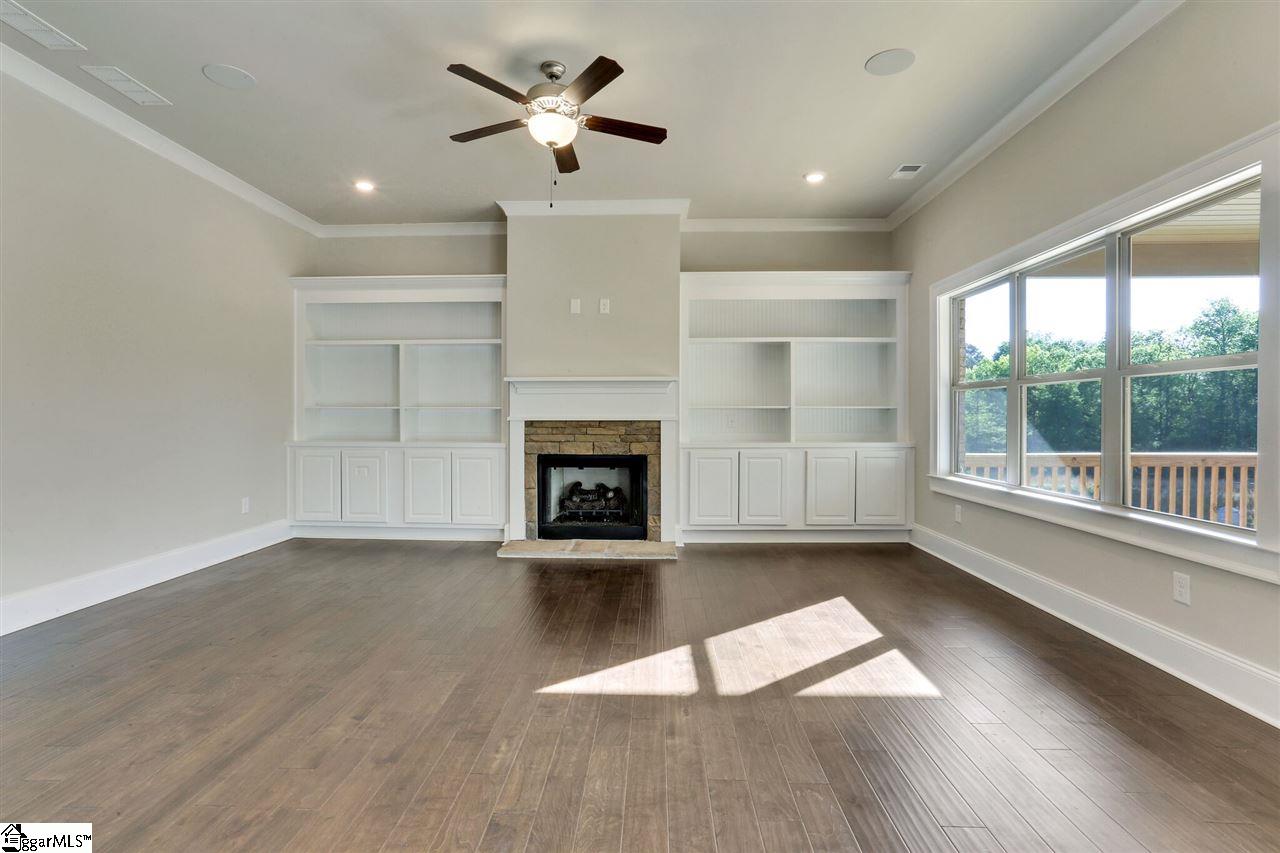 601 Rutland Court, Unit SITE 16 Greer, SC 29651 - Photo 10 of 34 Built-in bookshelving and 2 in-ceiling speakers controlled by wall-mounted Amazon Echo Dot!