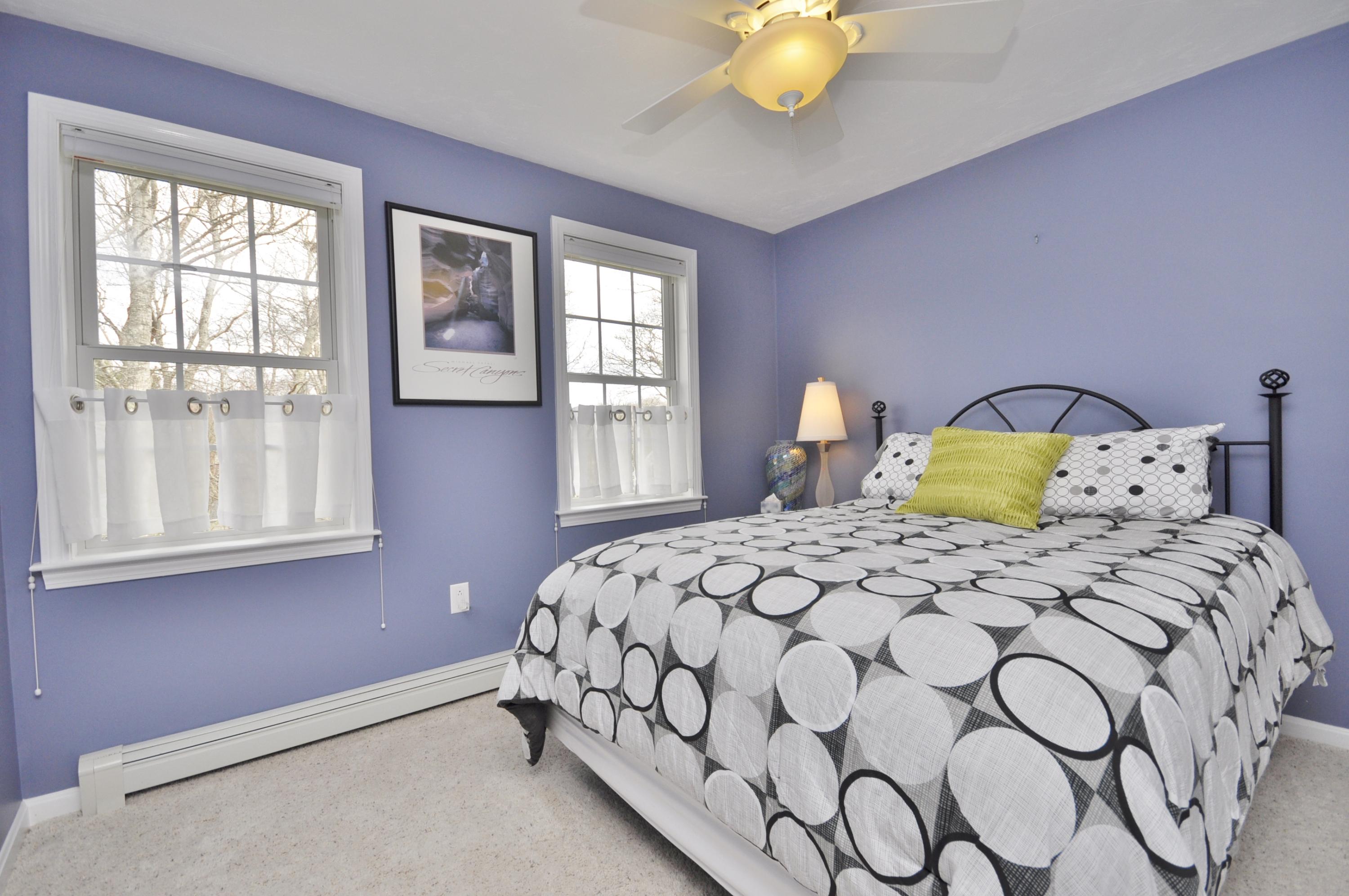 2 Crowell Road Sagamore Beach, MA 02562 - Photo 19 of 27 a bedroom with a bed and window