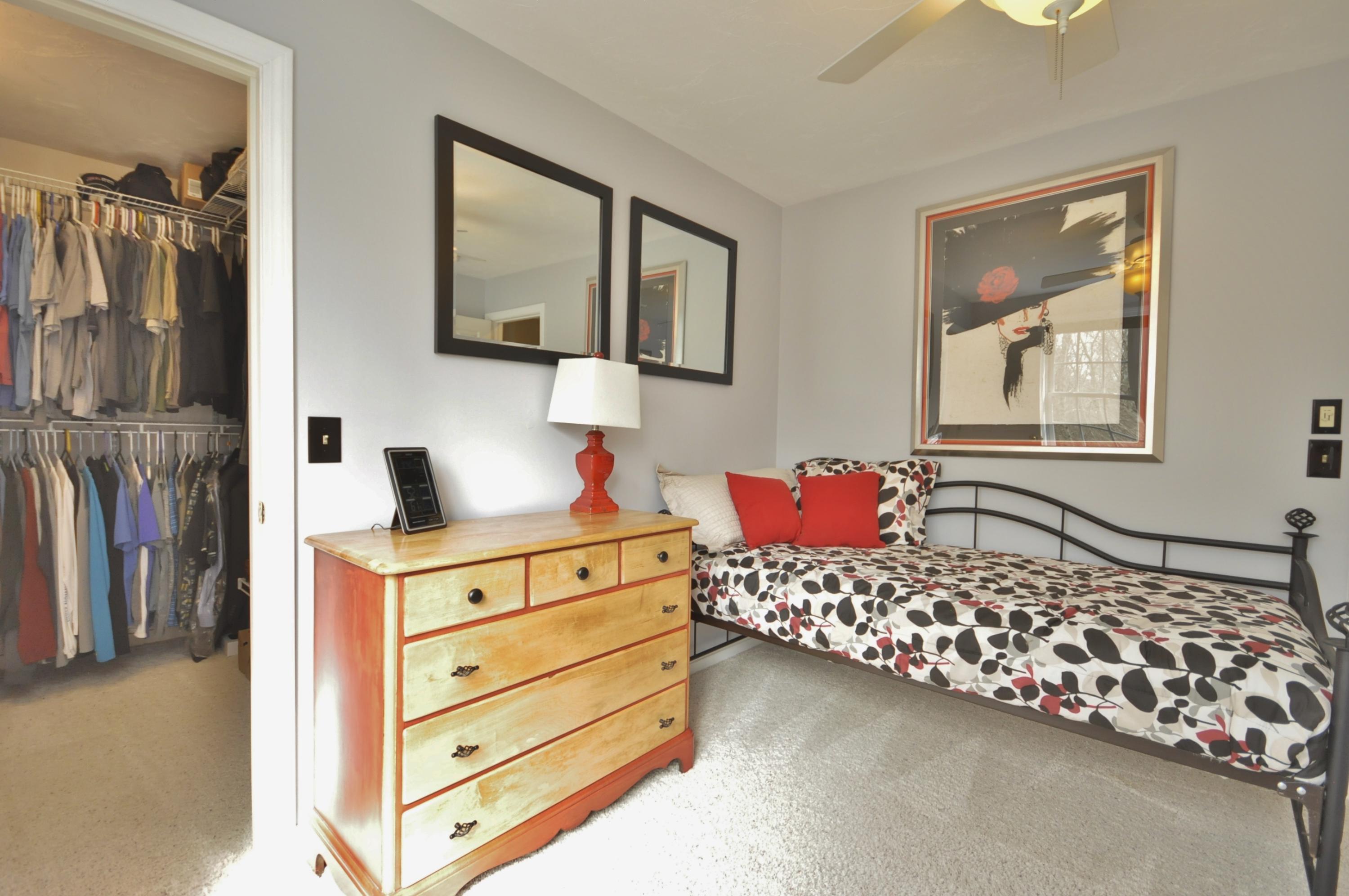 2 Crowell Road Sagamore Beach, MA 02562 - Photo 22 of 27 a bedroom with furniture and a window