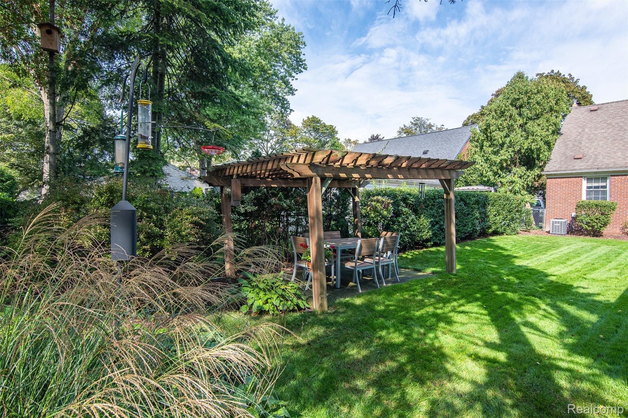 2023 Rosemont Road Berkley, MI 48072 - Photo 38 of 43 Private fenced back yard with pergola covered patio