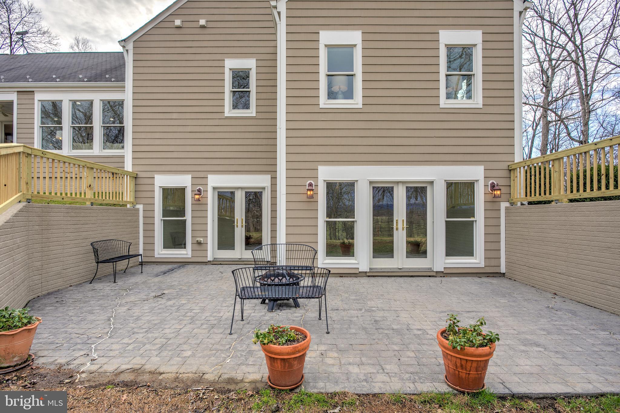 37218 Bolyn Road Purcellville, VA 20132 - Photo 12 of 62 a front view of a house with outdoor seating