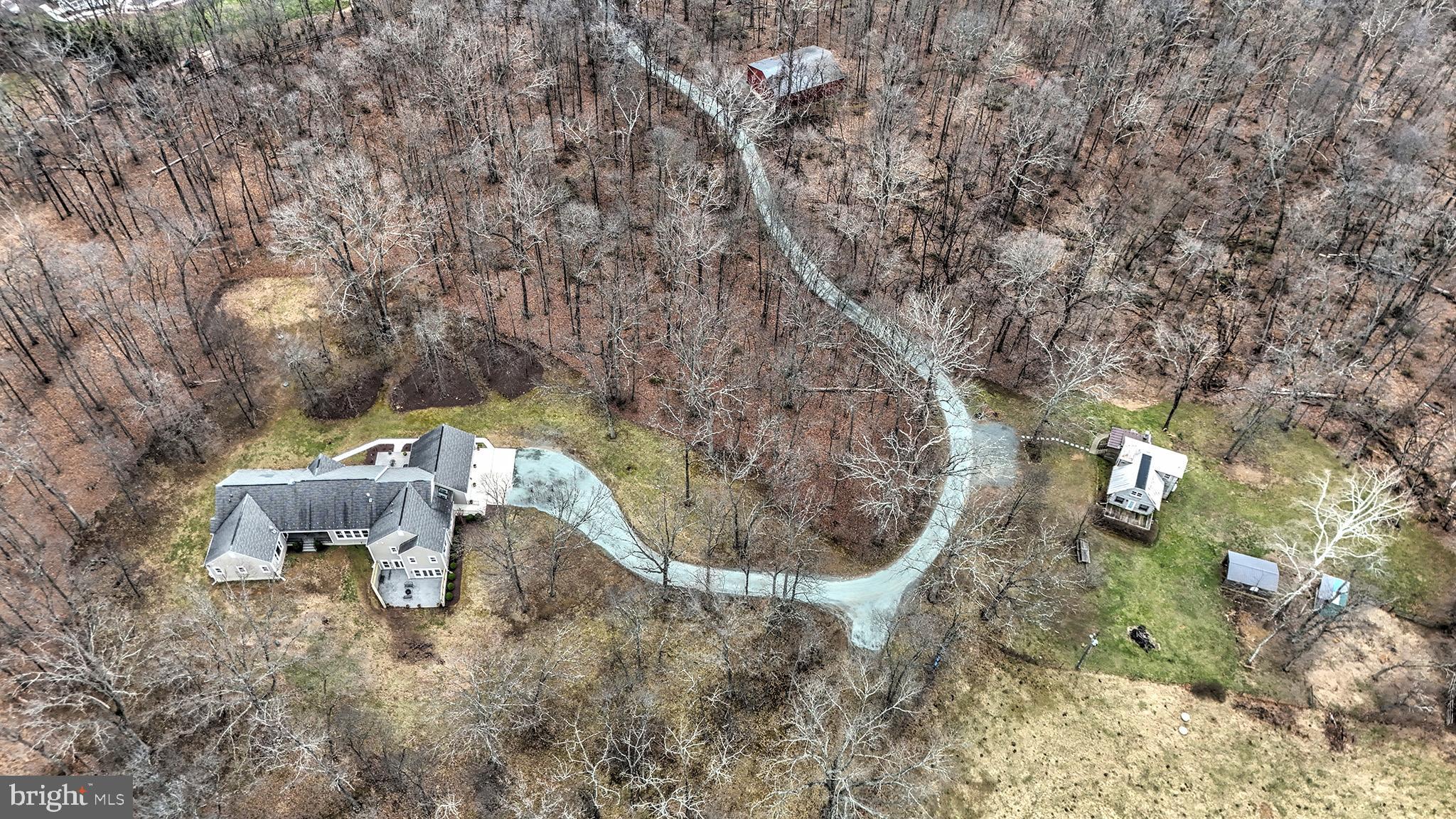 37218 Bolyn Road Purcellville, VA 20132 - Photo 2 of 62 a backyard of a house with a yard and outdoor seating