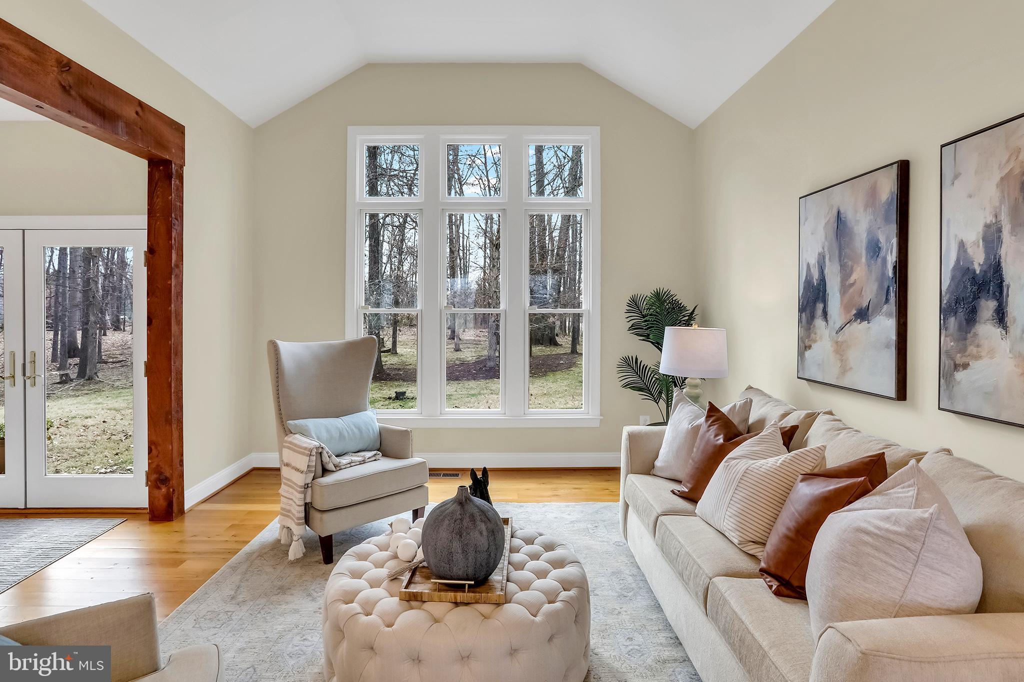 37218 Bolyn Road Purcellville, VA 20132 - Photo 25 of 62 a living room with furniture and large window with rug