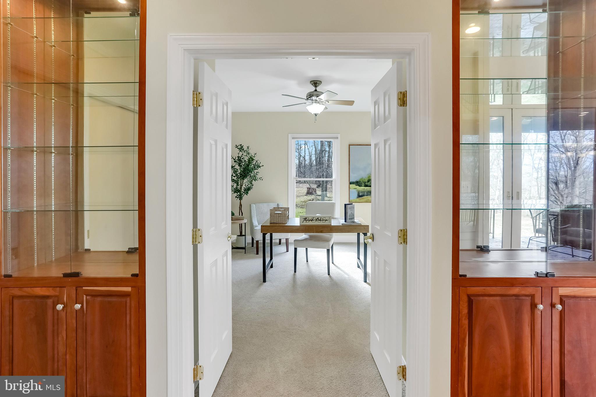 37218 Bolyn Road Purcellville, VA 20132 - Photo 27 of 62 Hallway Custom Built in cherry display cases