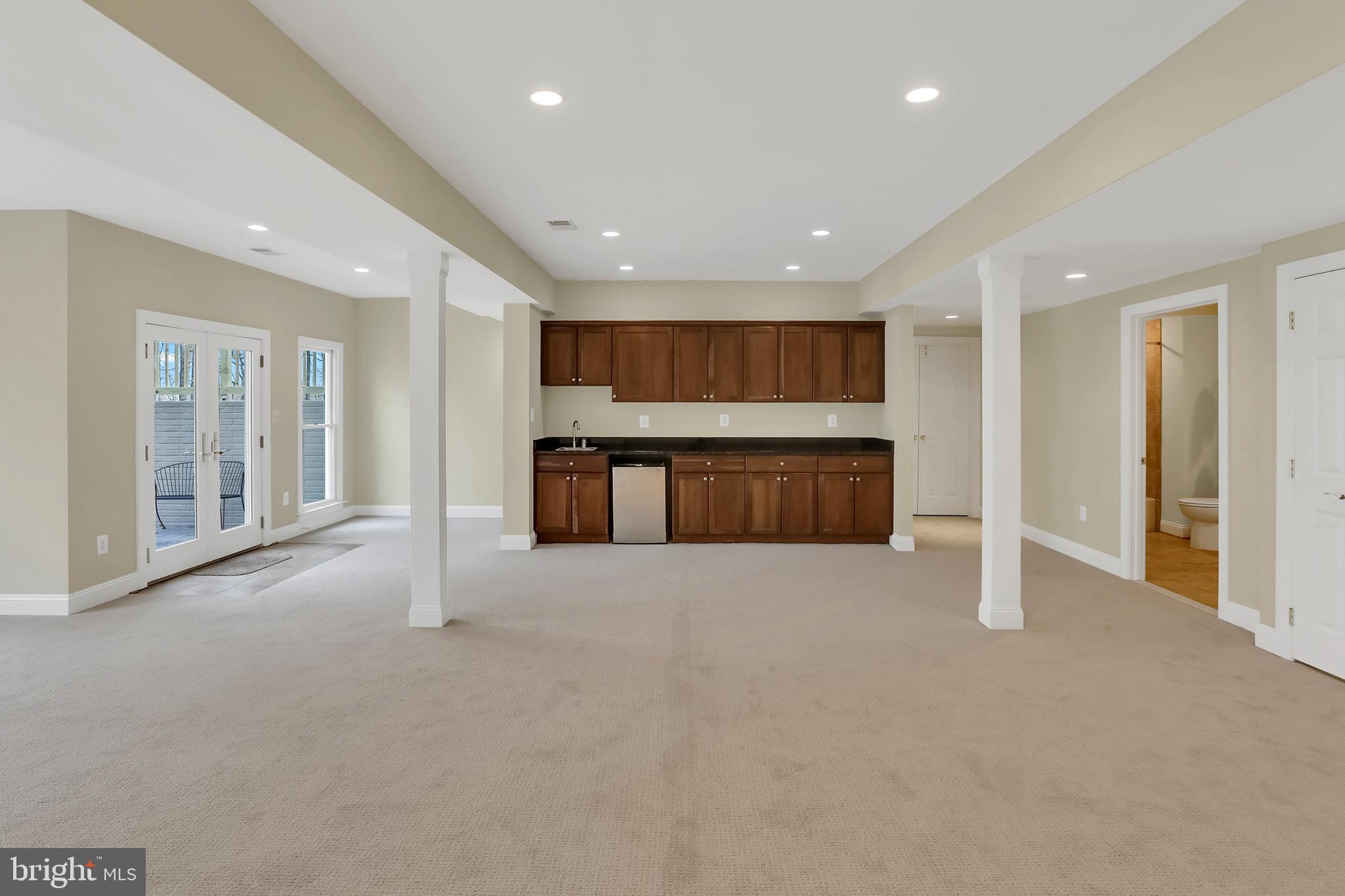 37218 Bolyn Road Purcellville, VA 20132 - Photo 38 of 62 Basement wet bar, walkout via 4 Atrium doors