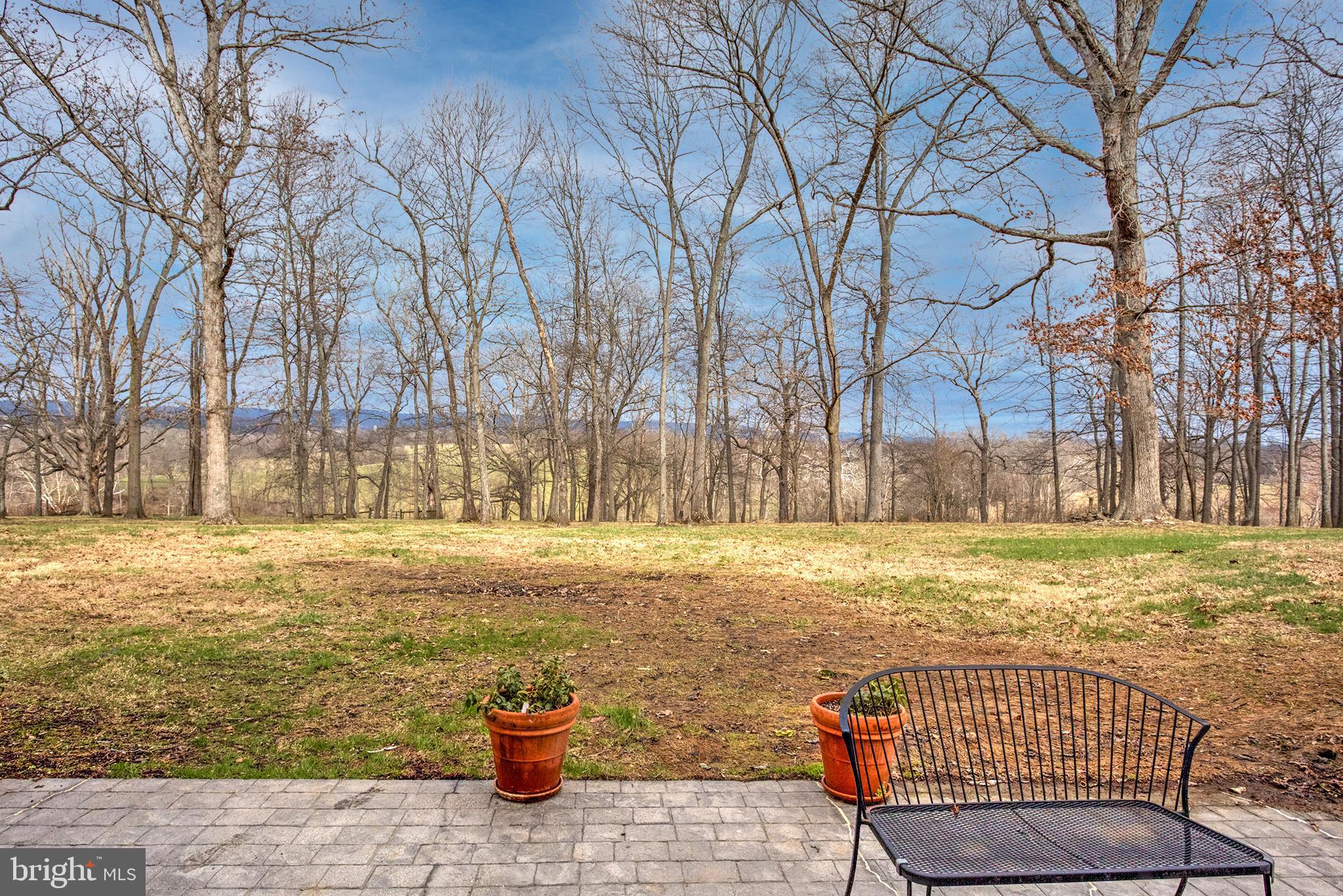 37218 Bolyn Road Purcellville, VA 20132 - Photo 42 of 62 a view of a swimming pool with a patio
