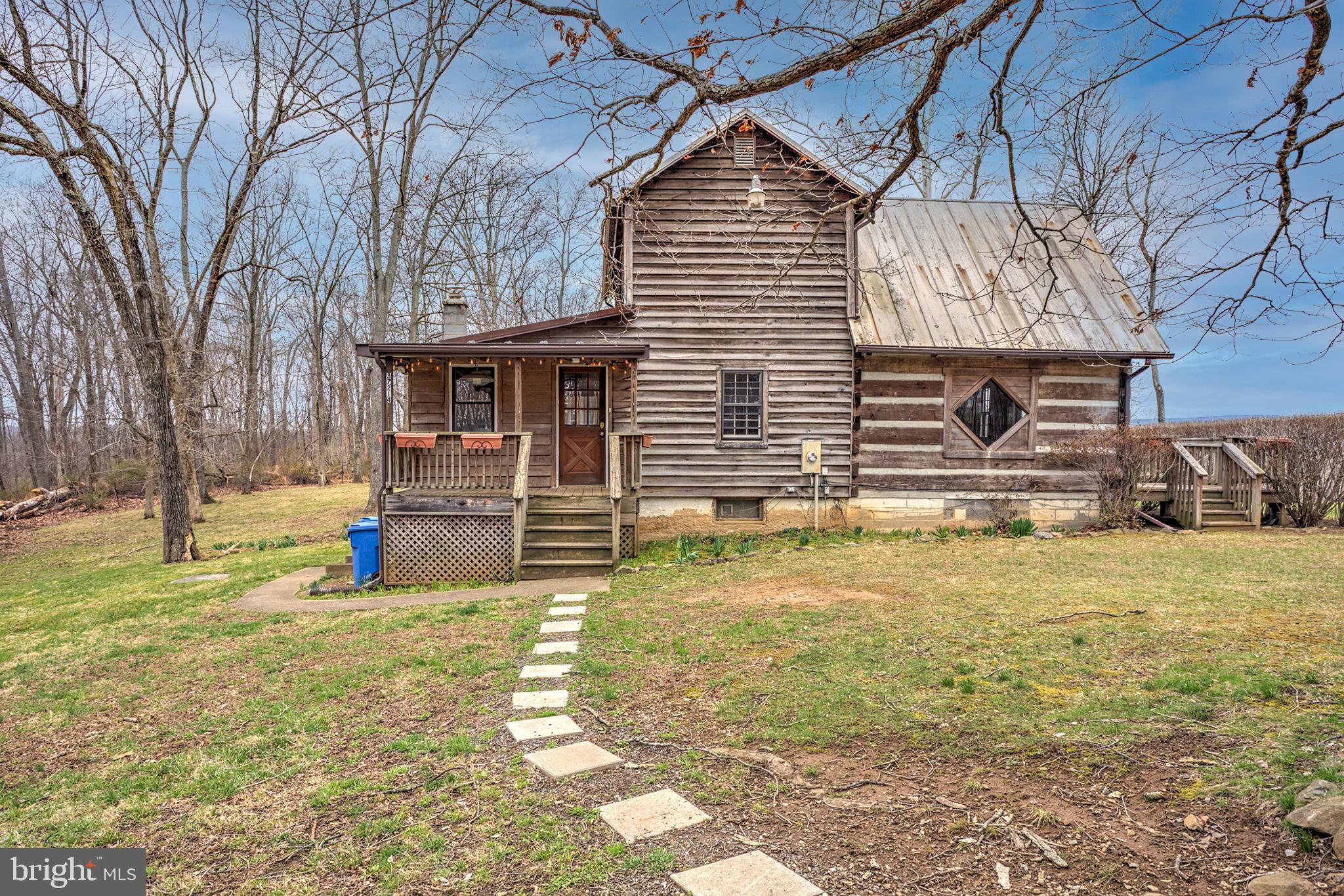 37218 Bolyn Road Purcellville, VA 20132 - Photo 43 of 62 a view of a house with snow on the wall