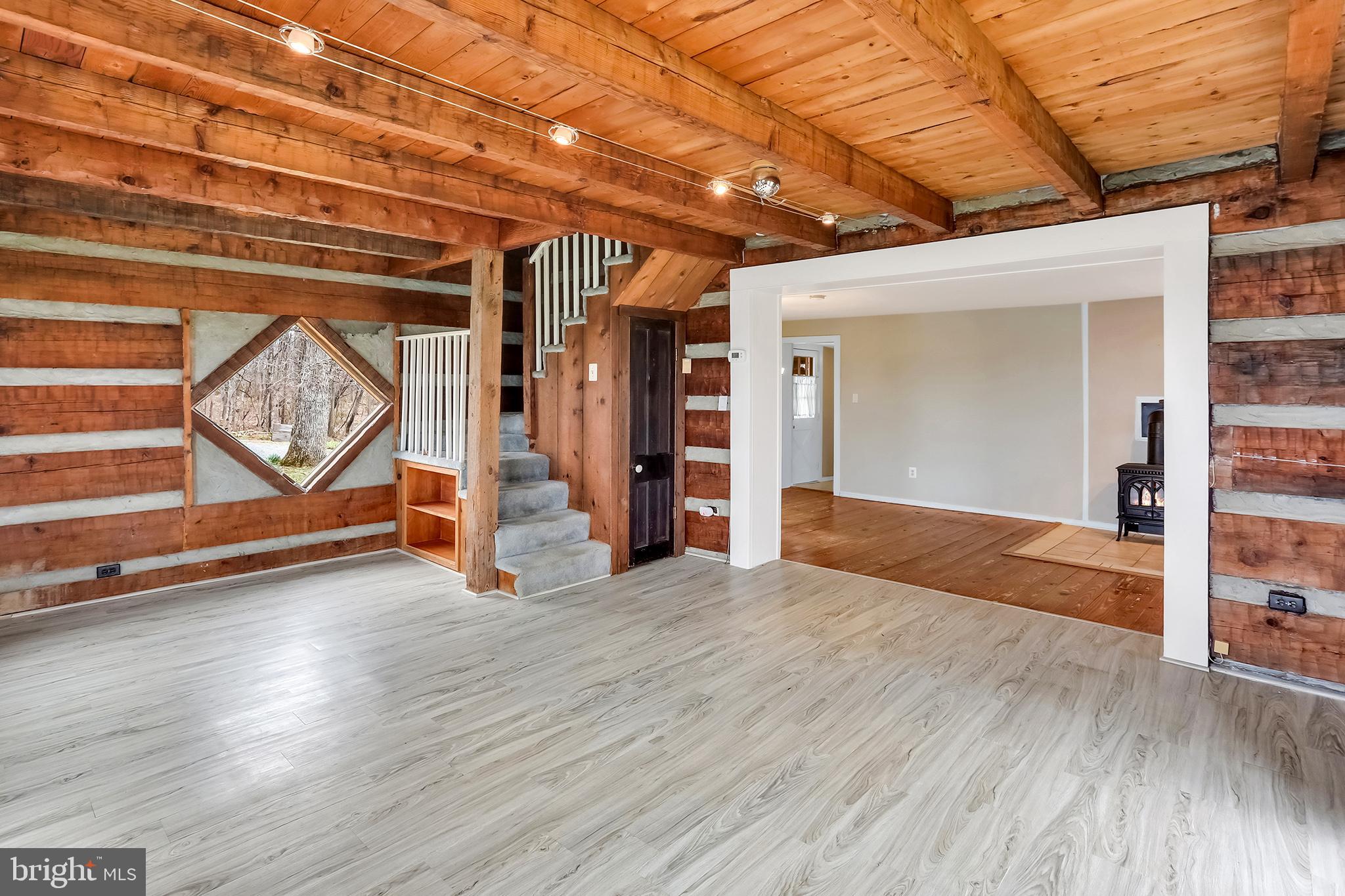 37218 Bolyn Road Purcellville, VA 20132 - Photo 47 of 62 an empty room with wooden floor and windows