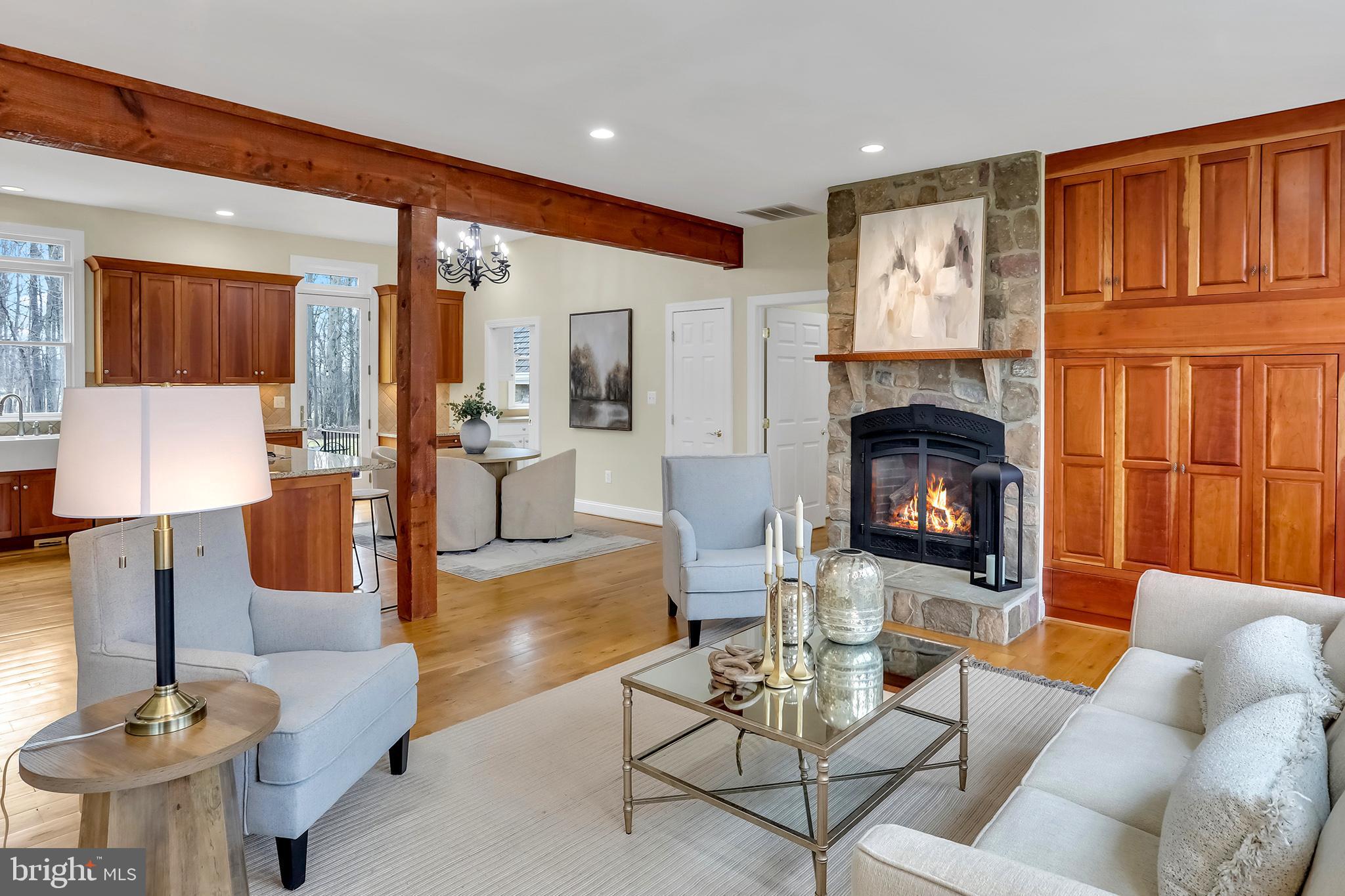37218 Bolyn Road Purcellville, VA 20132 - Photo 5 of 62 a living room with furniture and a fireplace