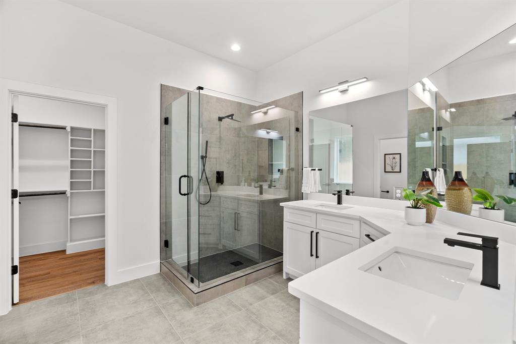 2227 Fordham Road Dallas, TX 75216 - Photo 13 of 30 a bathroom with a shower a sink a mirror and a shower