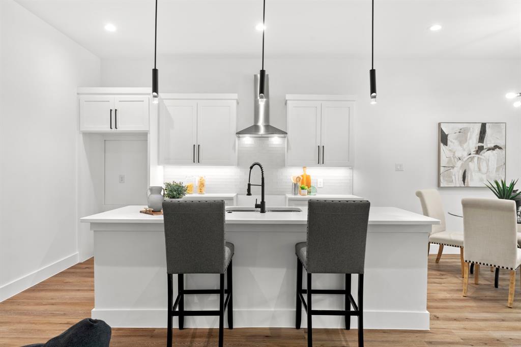 2227 Fordham Road Dallas, TX 75216 - Photo 16 of 30 a dining room with furniture and wooden floor